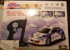 Masinuta radiocomandata noua cu leduri puternice - model Peugeot 206 - pe baterii 4xR6 AAA + 6F22 9V