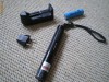LASER POINTER VERDE 200 mW/532 nm CU INCARCATOR SI ACUMULATOR ULTRAFIRE- ARE PUNCT REGLABIL+PROIECTII STELARE