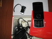Vand telefon LG KU 580 + casca bluetooth foto