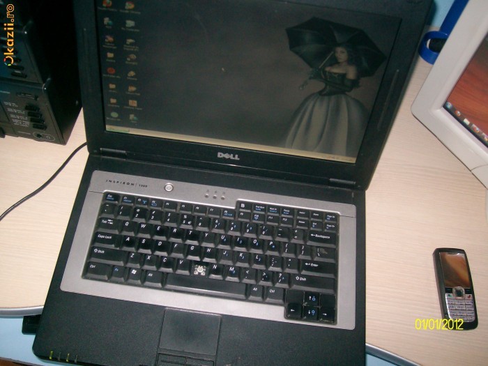 vand laptop dell inspiron 1300 foto mare