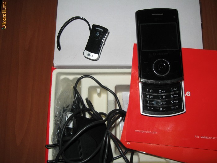 Vand telefon LG KU 580 + casca bluetooth foto mare